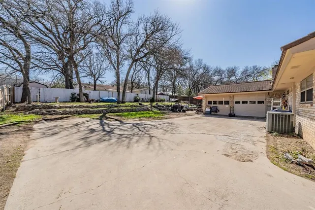 a bathroom with a sink double vanity and a mirror