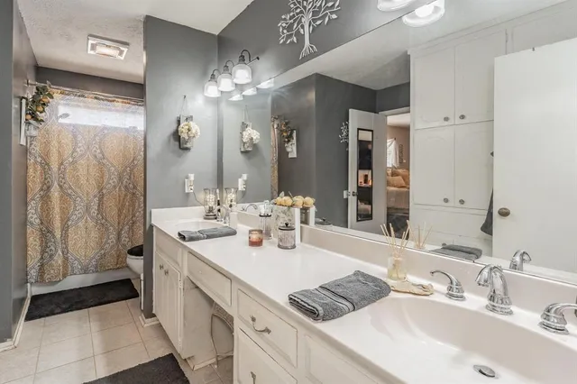 a view of a patio with chair and tables