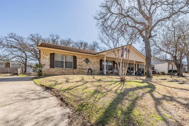 a view of a swimming pool with sitting area