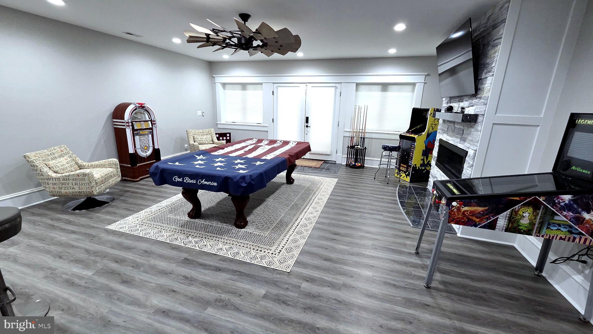 14612 Bristow Road Manassas, VA 20112 - Photo 8 of 12 Stylish game room with modern flair.