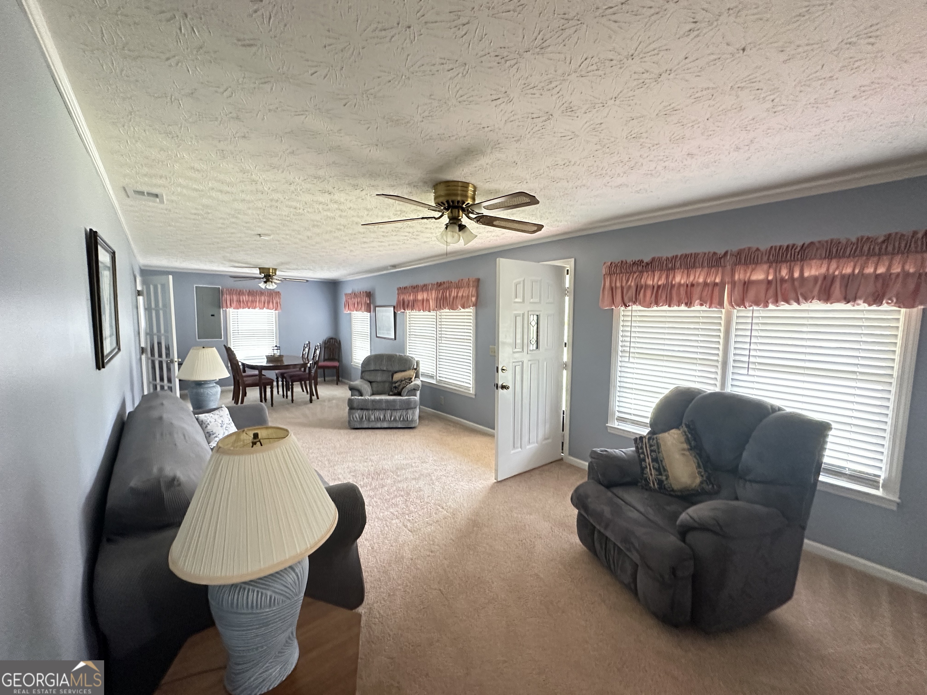 17 2nd Street McRae-Helena, GA 31037 - Photo 16 of 34 a living room with furniture and a window