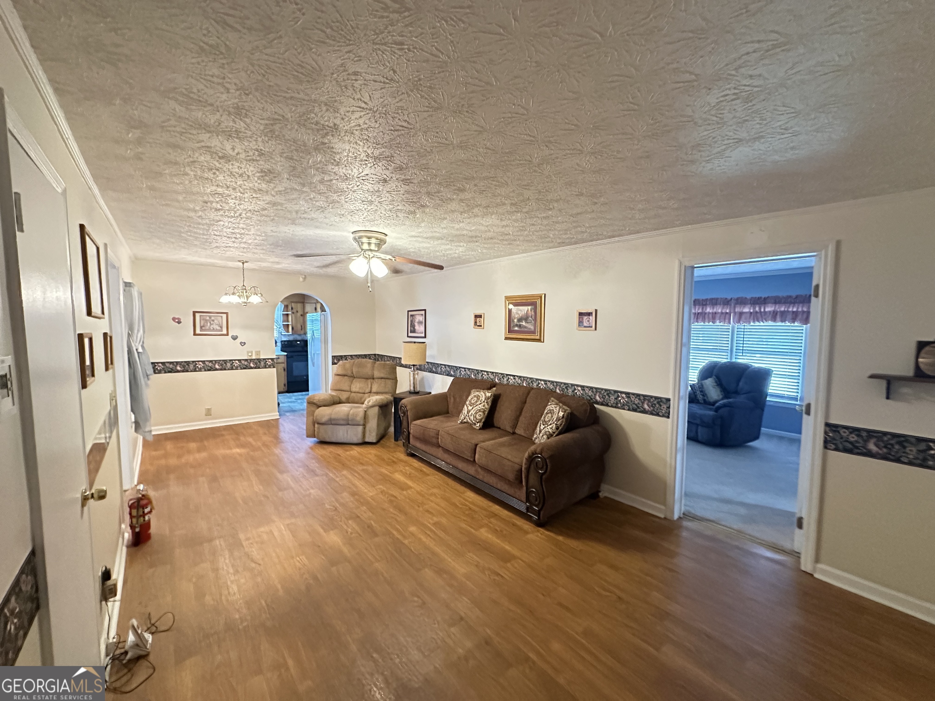 17 2nd Street McRae-Helena, GA 31037 - Photo 17 of 34 a living room with furniture and a wooden floor