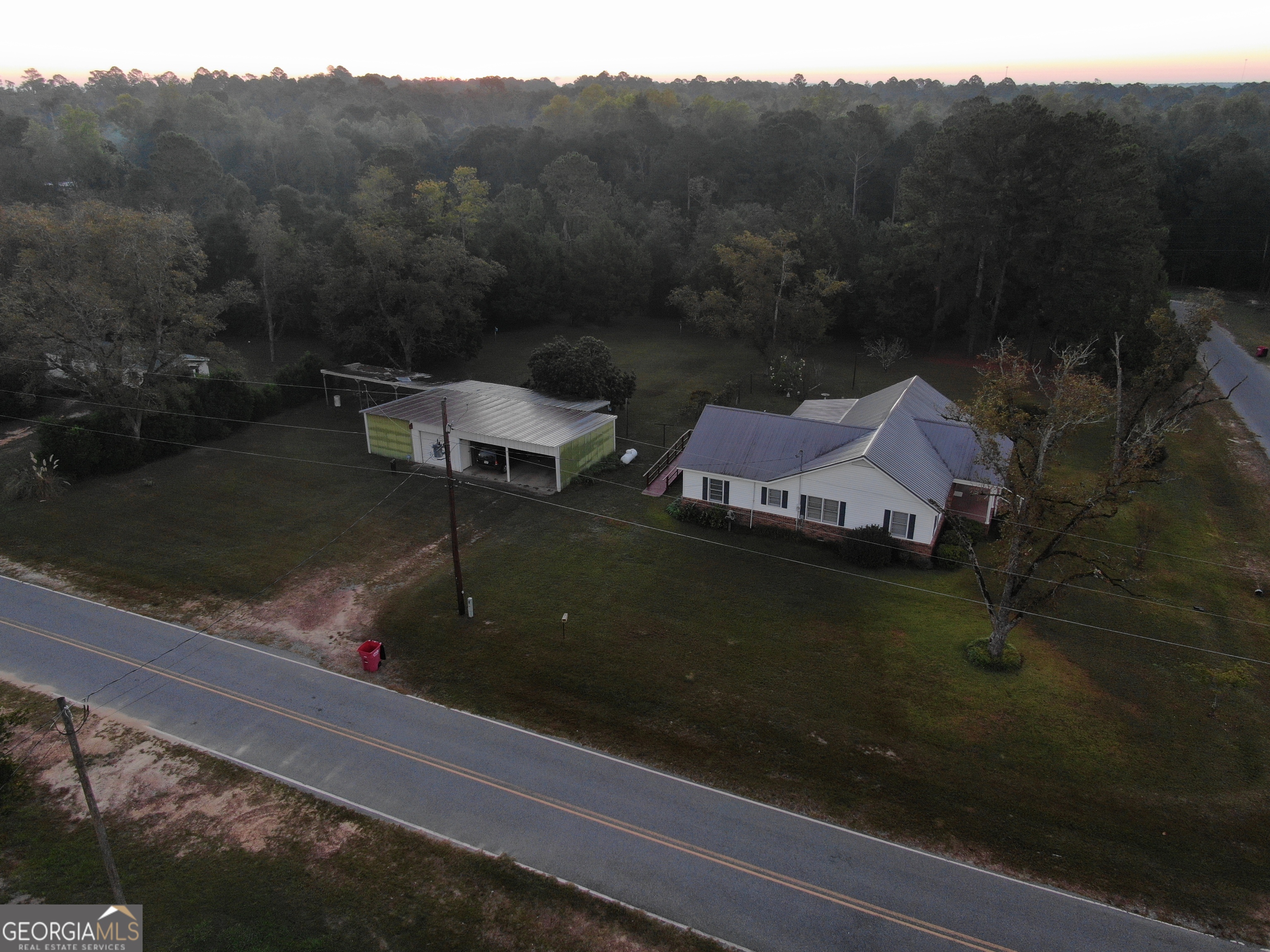 17 2nd Street McRae-Helena, GA 31037 - Photo 25 of 34 a terrace of a house with outdoor seating
