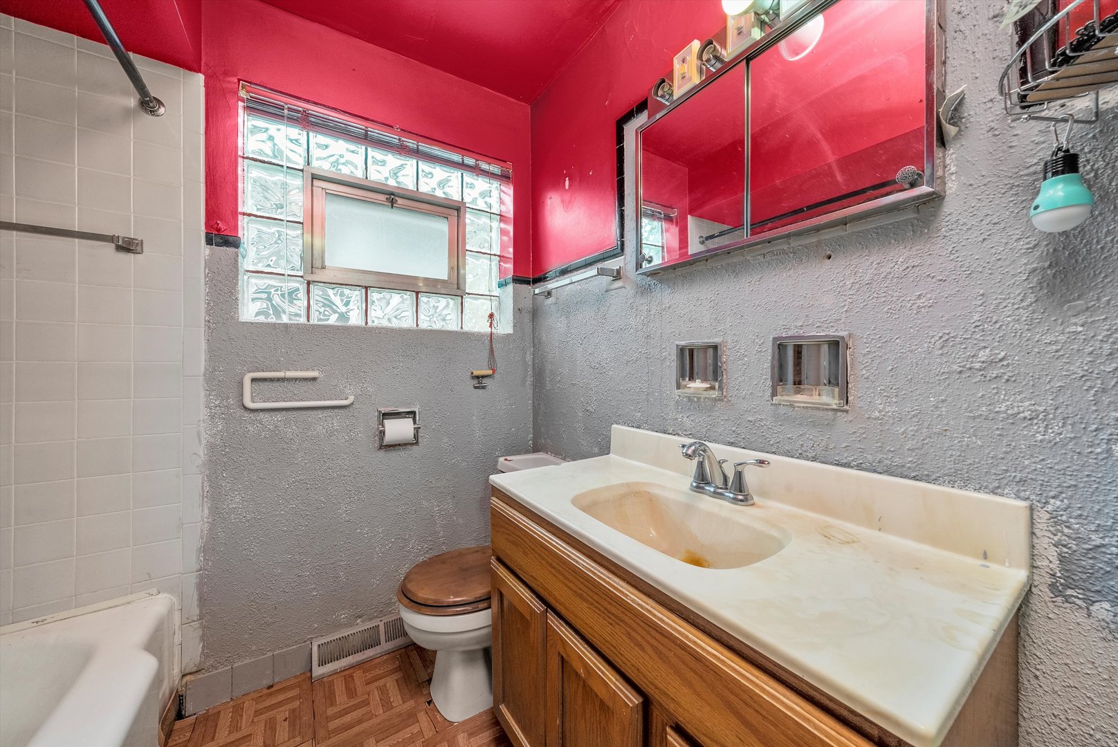 2044 West 69th Street Chicago, IL 60636 - Photo 11 of 27 a bathroom with a sink a toilet and shower