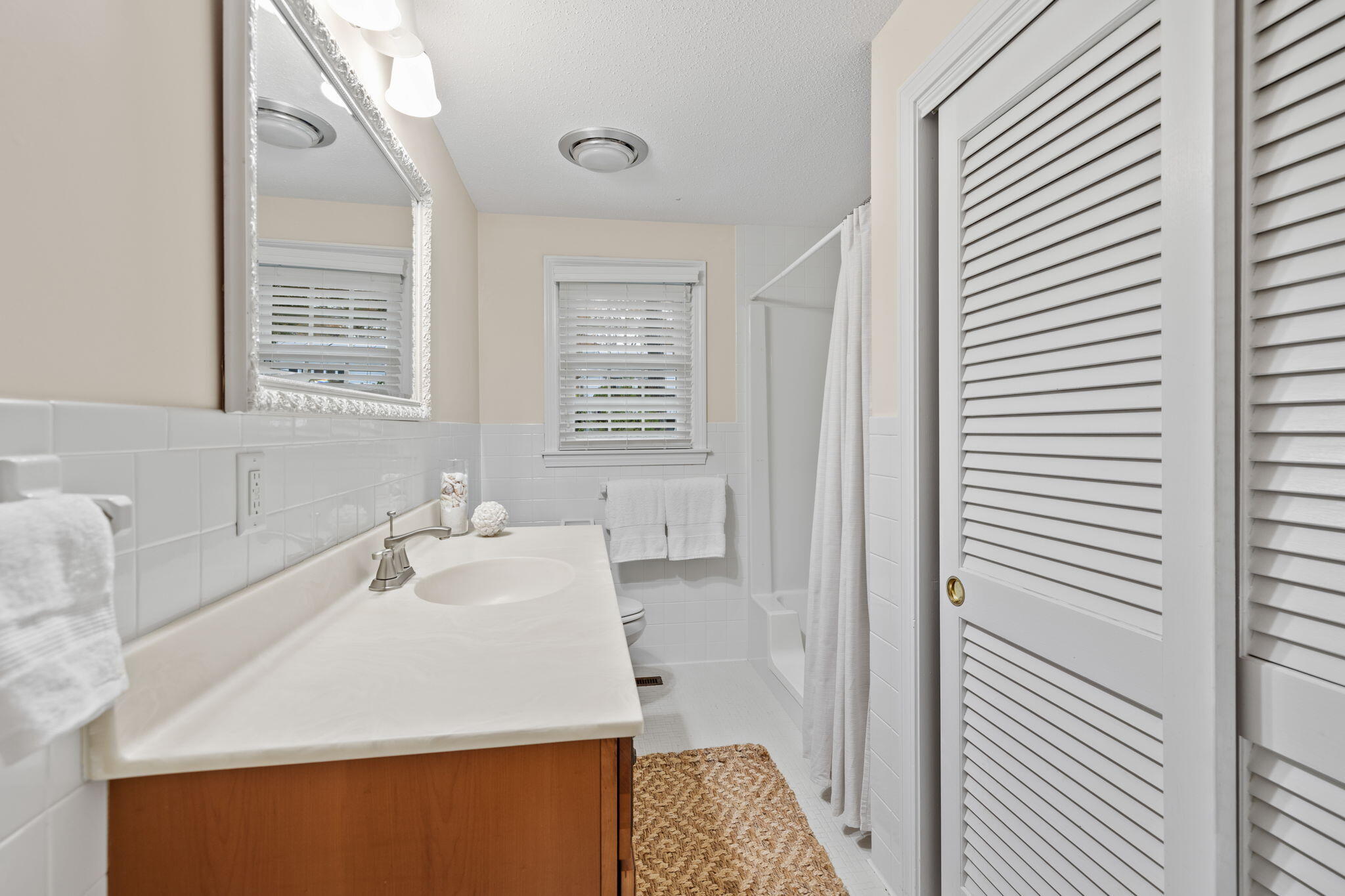 9 Ansel Howland Road Centerville, MA 02632 - Photo 17 of 27 a bathroom with a sink and a bathtub