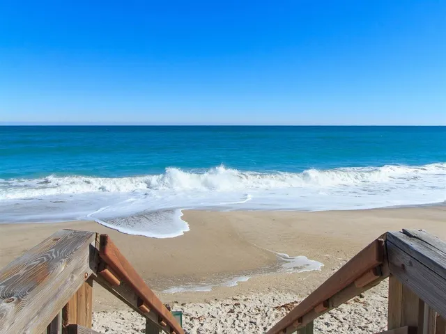 a view of an ocean from a balcony