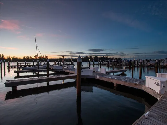 a view of swimming pool with outdoor seating