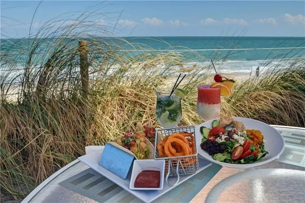 a view of a room with a water heater and a chair
