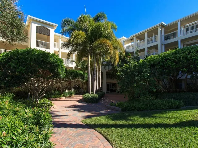 a view of a building with a yard