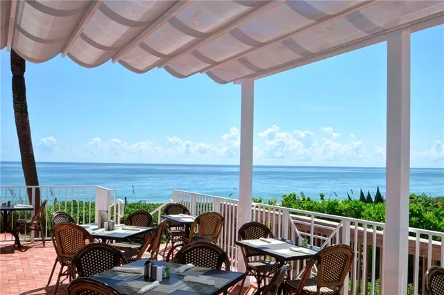 a view of an outdoor space with furniture