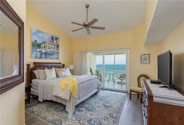 a bed room with a bed and a tv