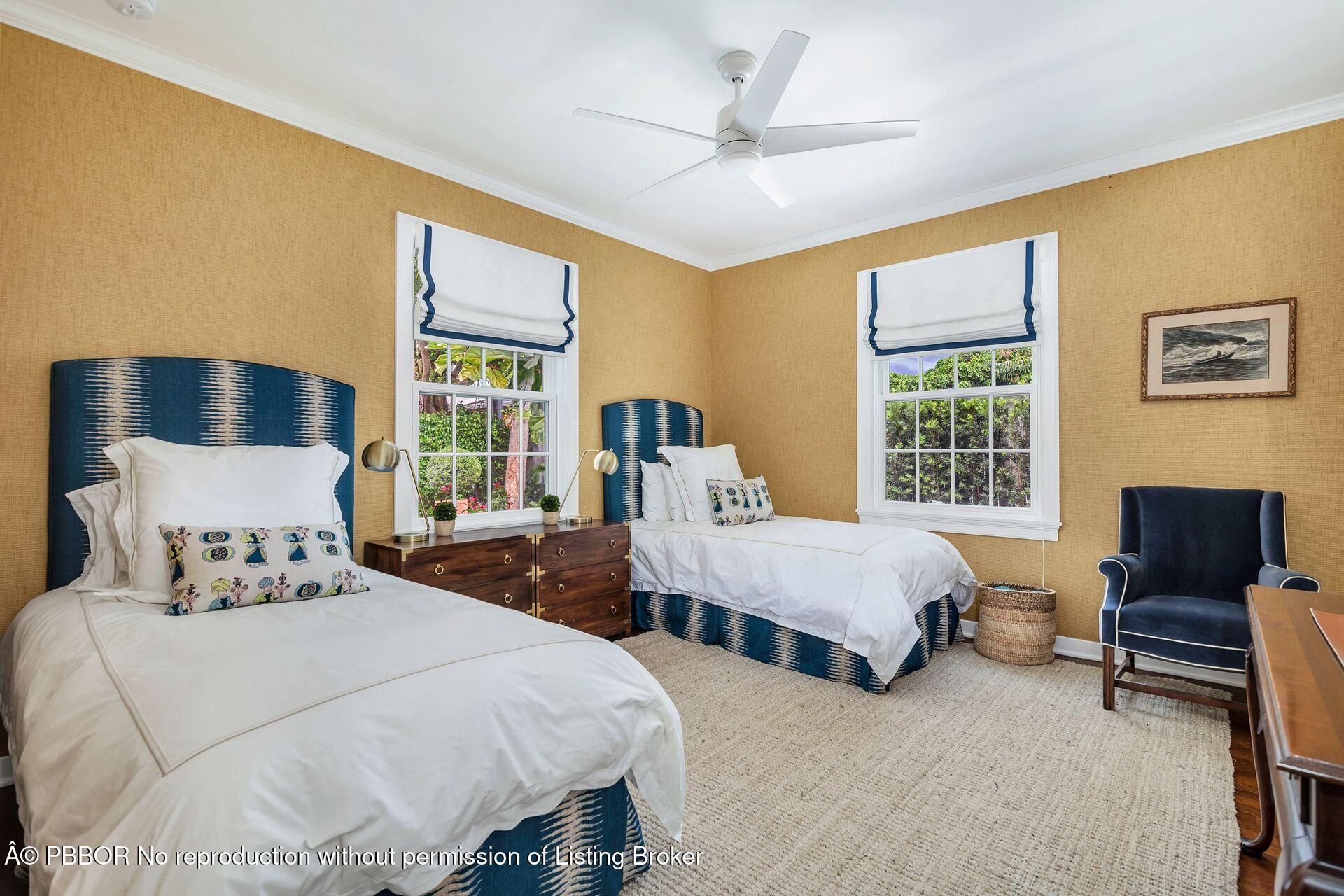 255 Colonial Lane Palm Beach, FL 33480 - Photo 16 of 32 a bedroom with two beds and a window