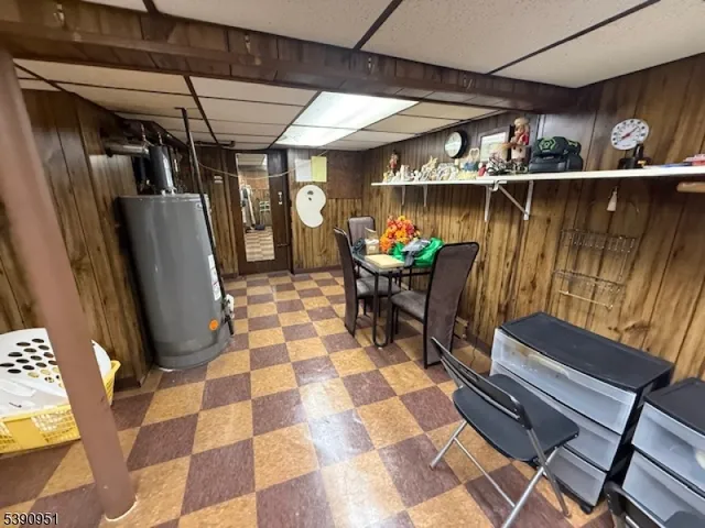 a view of a chairs and a table in a room