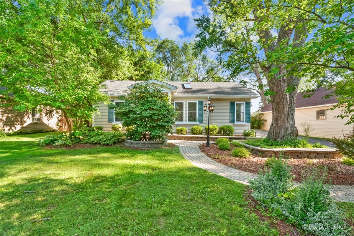 116 Deerpath Road Lake In The Hills, IL 60156 - Photo 1 of 33 a view of a house with a yard patio and a small yard
