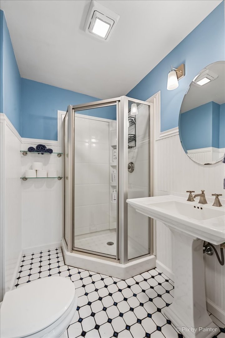 116 Deerpath Road Lake In The Hills, IL 60156 - Photo 15 of 33 a bathroom with a sink toilet and shower