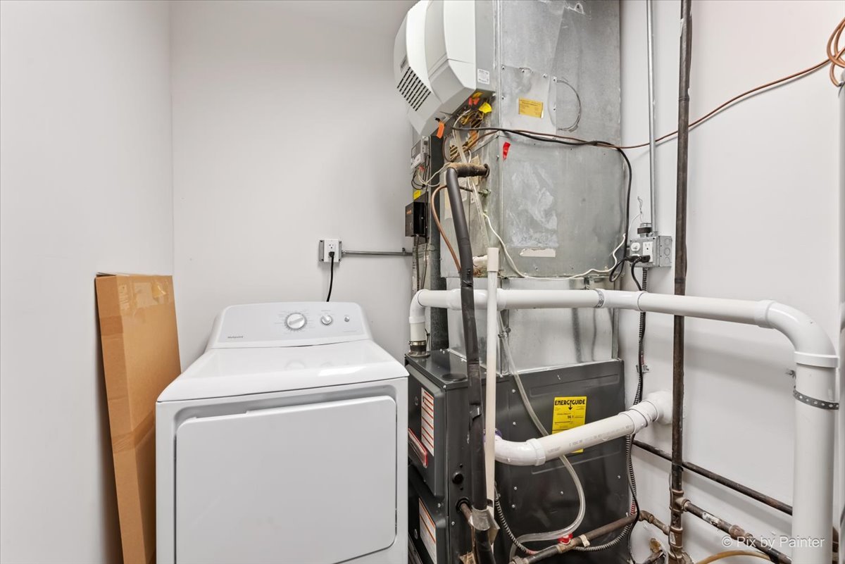 116 Deerpath Road Lake In The Hills, IL 60156 - Photo 21 of 33 a utility room with dryer and washer