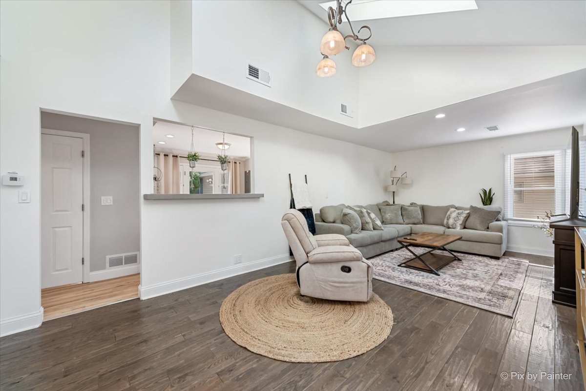 116 Deerpath Road Lake In The Hills, IL 60156 - Photo 6 of 33 a living room with furniture and a wooden floor