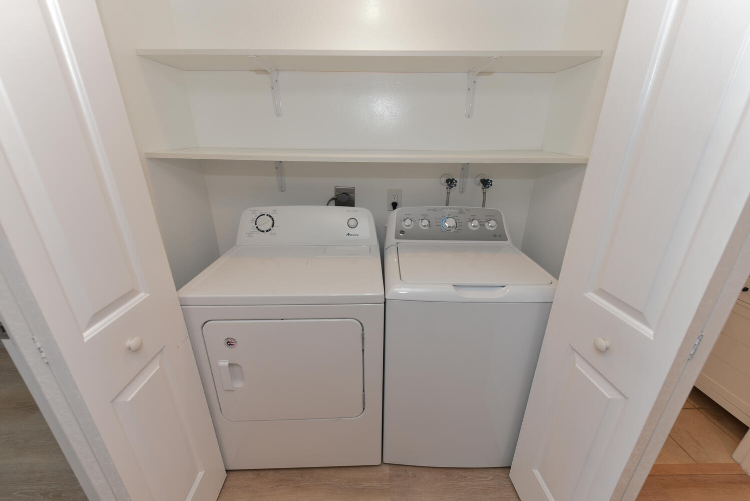 1605 Highway 1, Unit M1403 Jupiter, FL 33477 - Photo 19 of 34 a utility room with dryer and washer