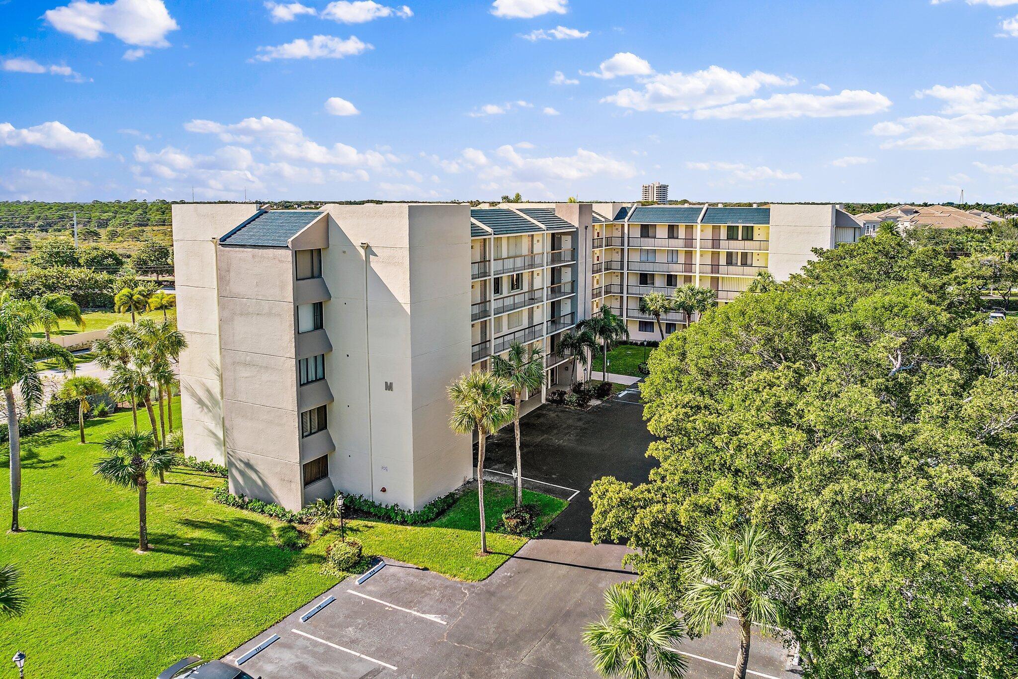 1605 Highway 1, Unit M1403 Jupiter, FL 33477 - Photo 2 of 34 a view of a city with tall buildings