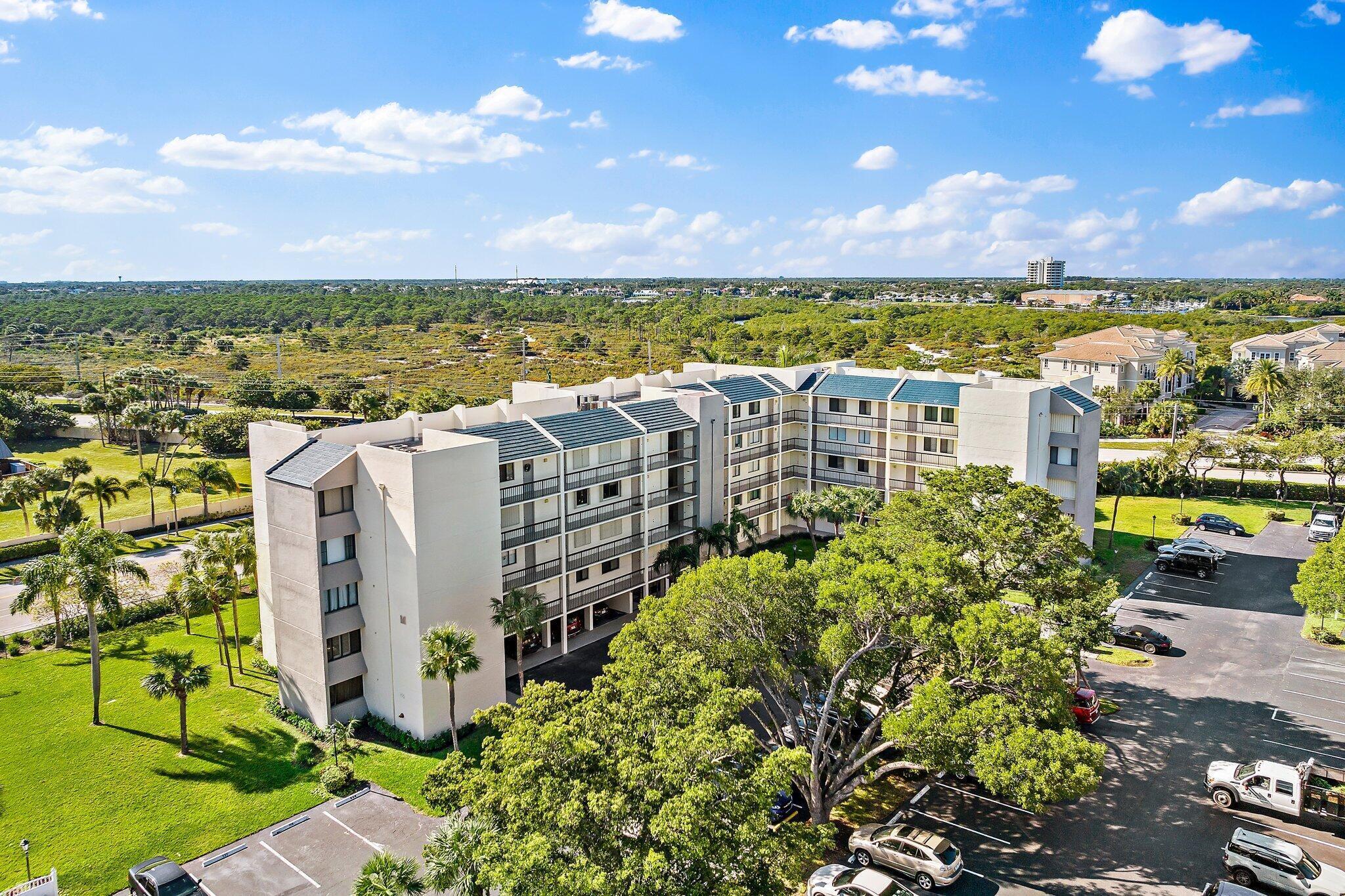 1605 Highway 1, Unit M1403 Jupiter, FL 33477 - Photo 32 of 34 a view of a city with lots of buildings in the background