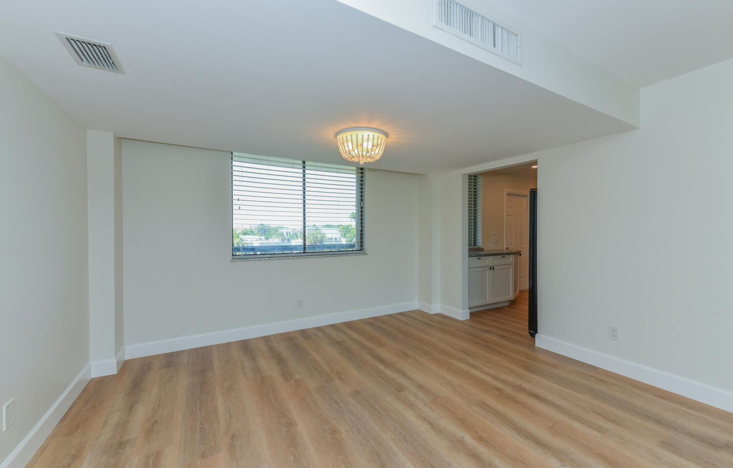 1605 Highway 1, Unit M1403 Jupiter, FL 33477 - Photo 7 of 34 an empty room with windows and closet