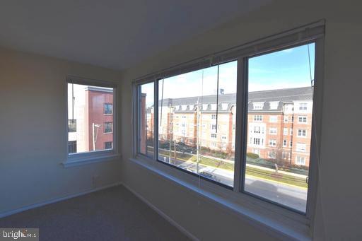 4313 Knox Road, Unit 501 College Park, MD 20740 - Photo 8 of 17 a view of an empty room with a large window