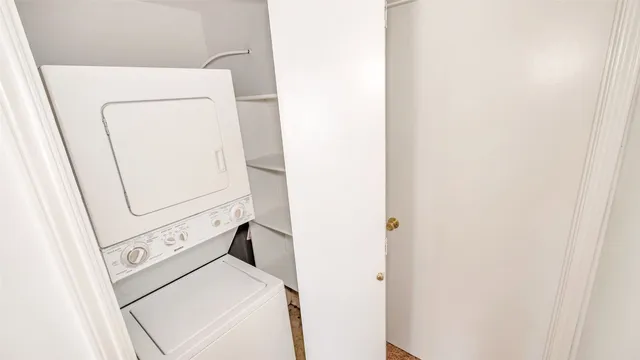 a view of a balcony with wooden floor