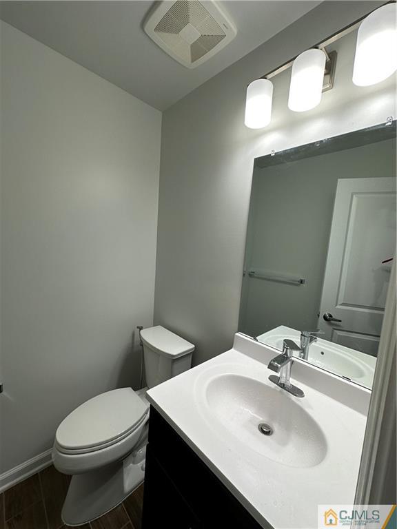 4102 Hana Road Edison, NJ 08817 - Photo 4 of 40 a bathroom with a sink and a toilet