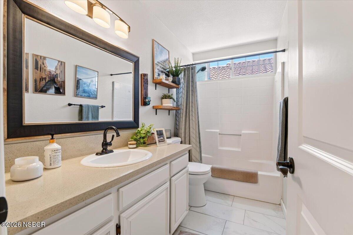 1513 Woodmere Road Santa Maria, CA 93455 - Photo 23 of 47 Hallway Bathroom