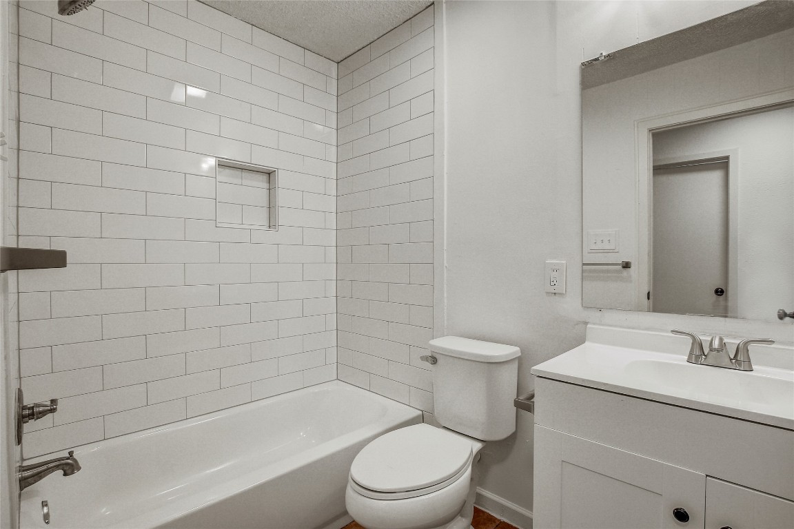 902 King Albert Street, Unit A Austin, TX 78745 - Photo 13 of 19 Full bath featuring shower / bathtub combination and vanity