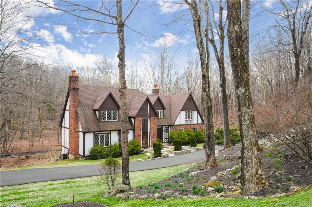 94 Limekiln Road Redding, CT 06896 - Photo 1 of 1 a view of a large house with a yard and pathway