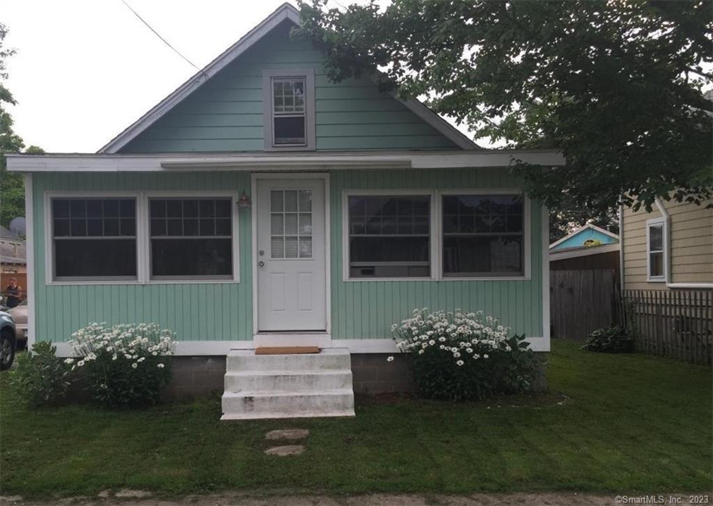 Adorable Bungalow offering open floor plan... private beach rights--