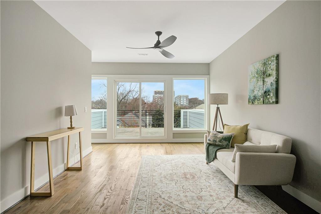 454 Connally Street Southeast Atlanta, GA 30312 - Photo 26 of 32 a living room with furniture and a large window