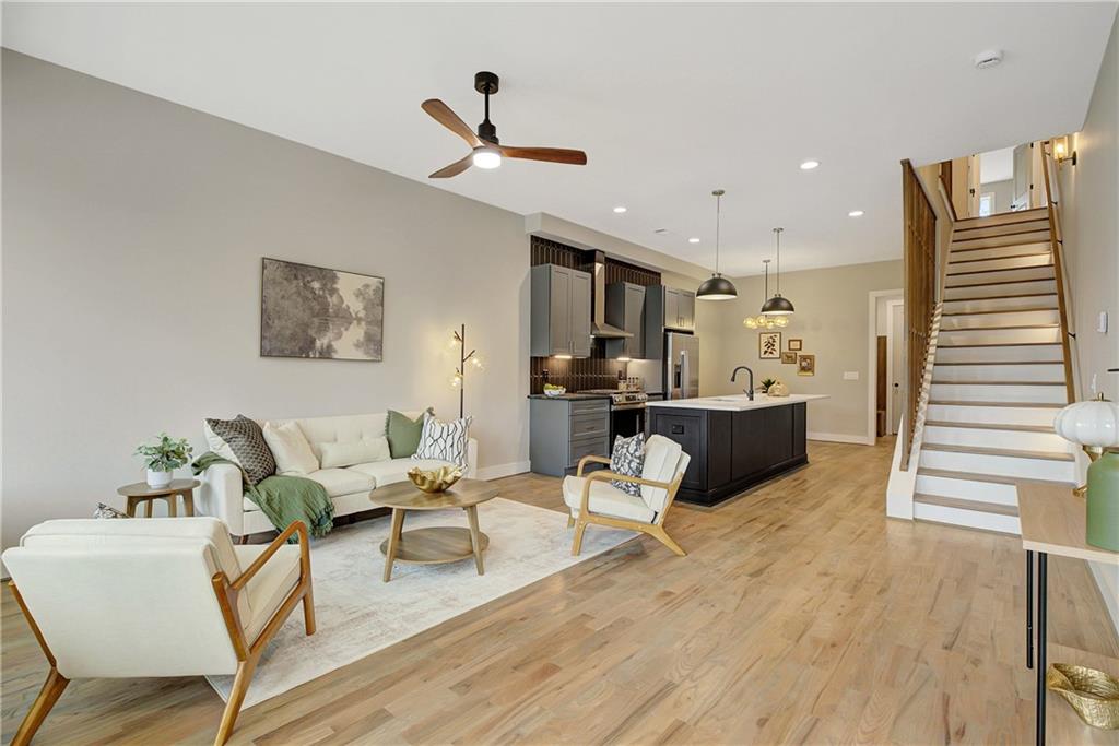 454 Connally Street Southeast Atlanta, GA 30312 - Photo 3 of 32 a living room with furniture and kitchen view