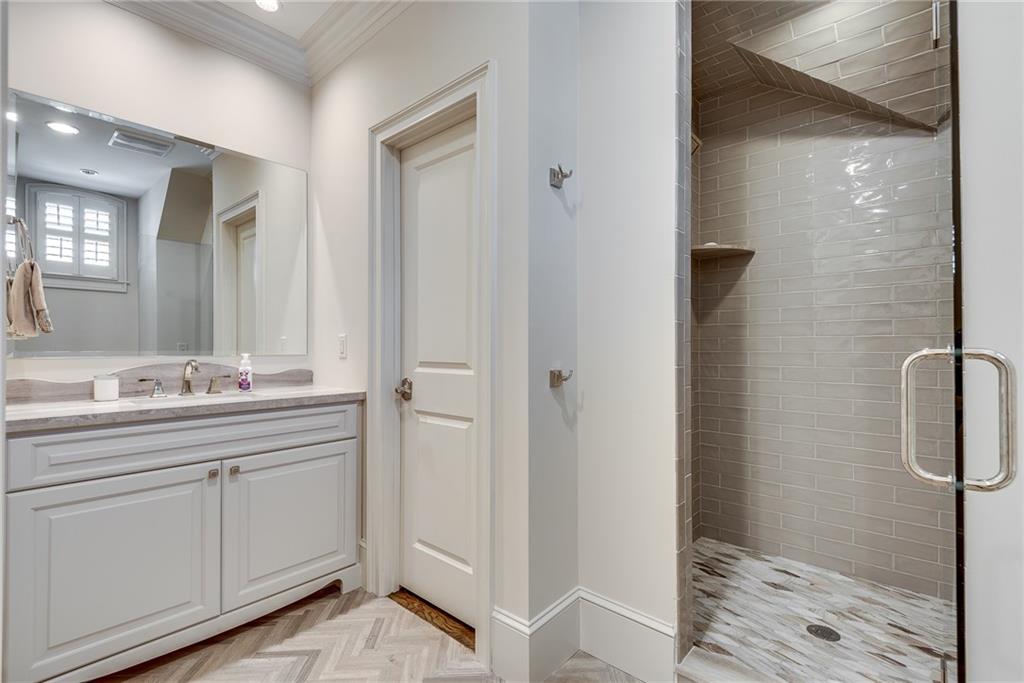 187 Fontaine Road Southwest Mableton, GA 30126 - Photo 54 of 84 a bathroom with a shower sink and mirror