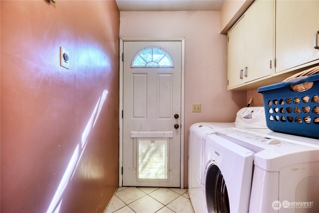 1857 Washington Drive Point Roberts, WA 98281 - Photo 11 of 38 a utility room with dryer and washer