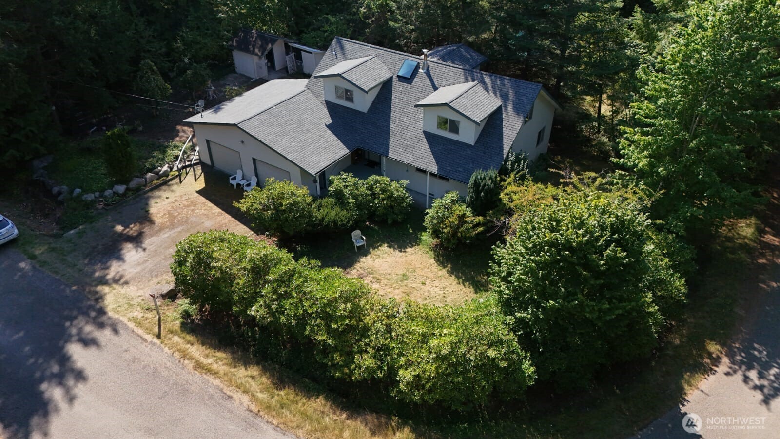 1857 Washington Drive Point Roberts, WA 98281 - Photo 2 of 38 an aerial view of a house with garden space and sitting space