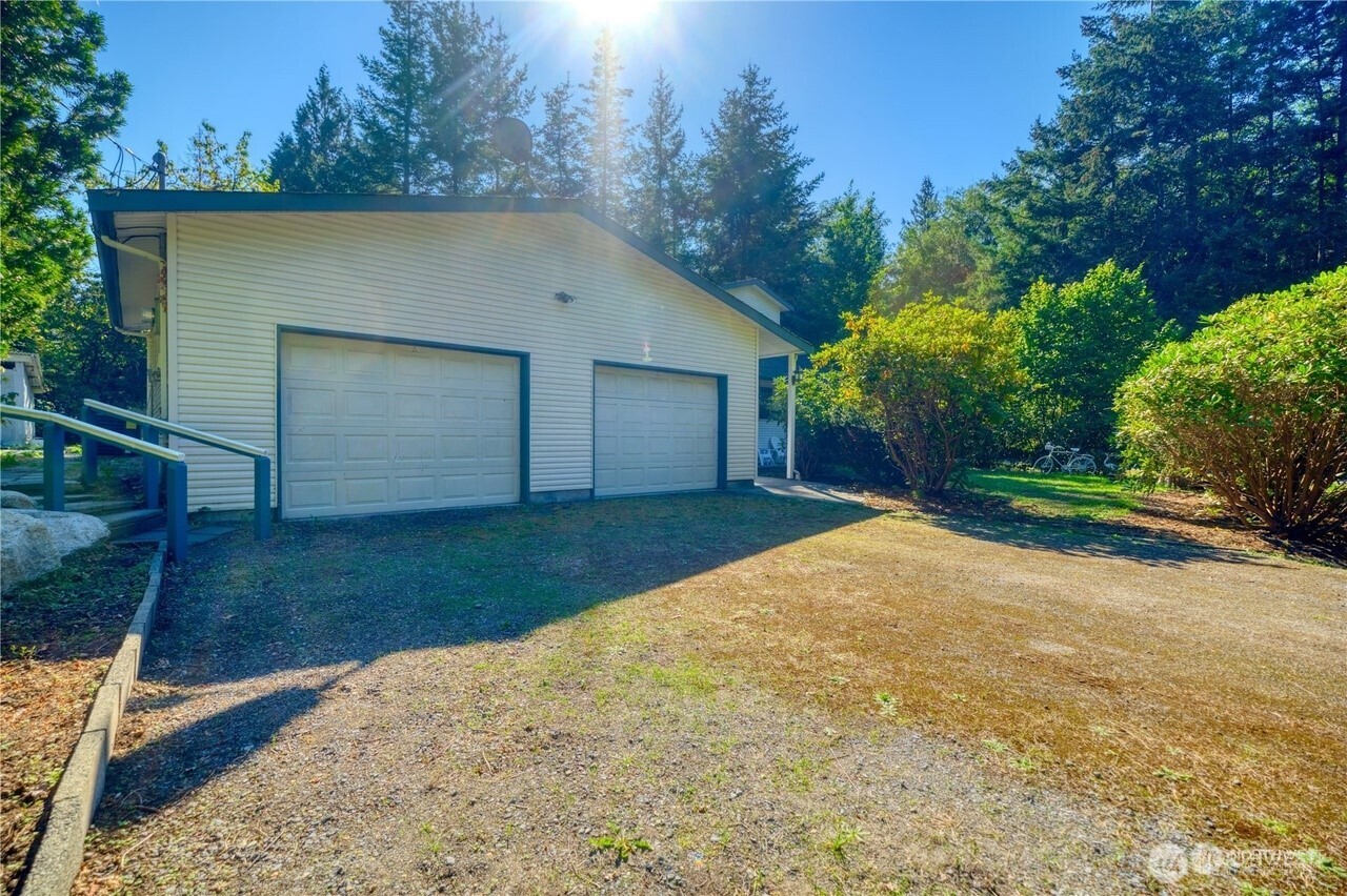 1857 Washington Drive Point Roberts, WA 98281 - Photo 3 of 38 a view of backyard and garage