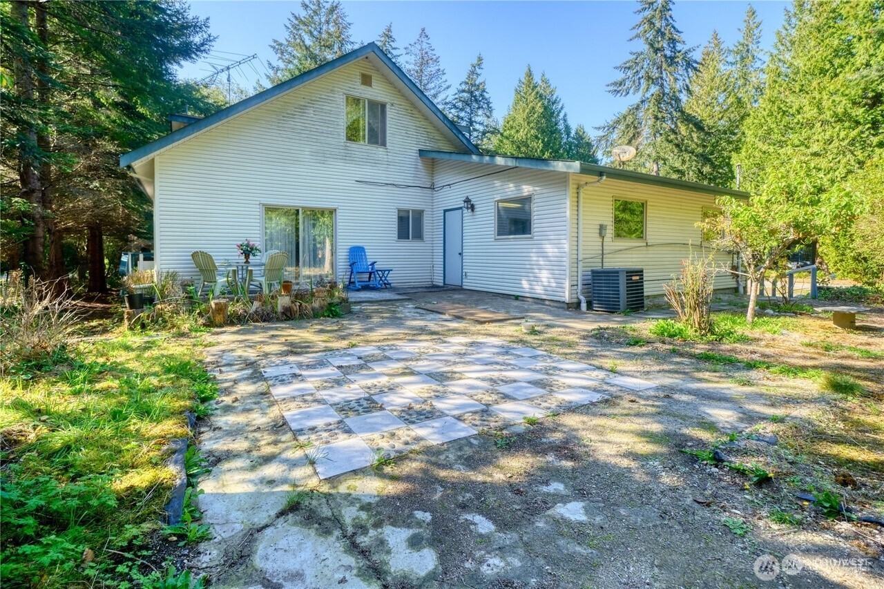 1857 Washington Drive Point Roberts, WA 98281 - Photo 34 of 38 a view of a house with backyard and sitting area