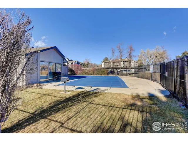 a view of house with yard