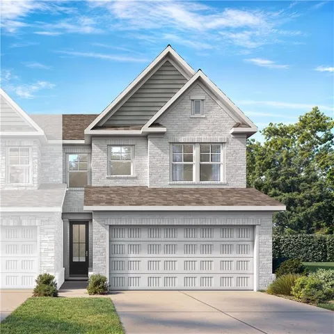 a house view with a garden space