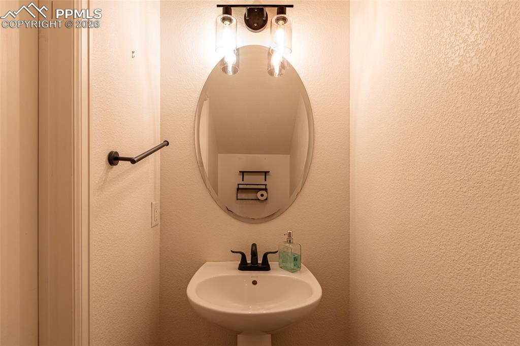 7740 Sandy Springs Point Fountain, CO 80817 - Photo 16 of 34 Bathroom featuring a sink