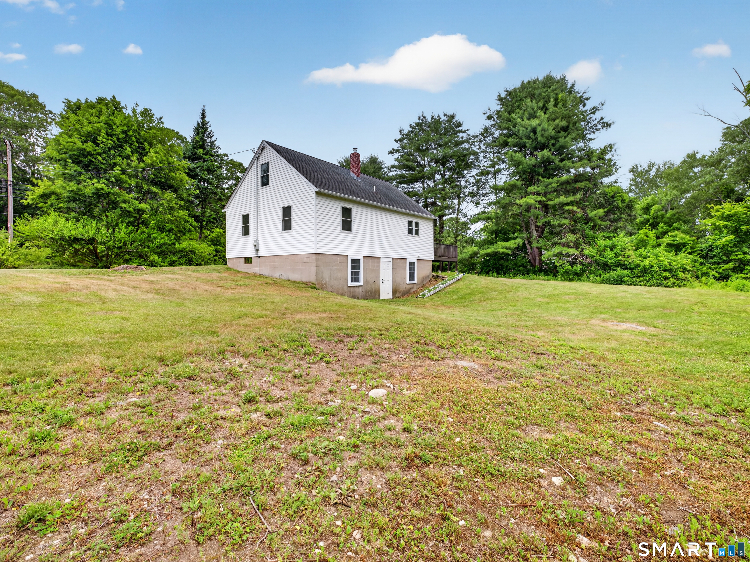 1039 N Road Groton, CT 06340 - Photo 23 of 26 a house view with a garden space