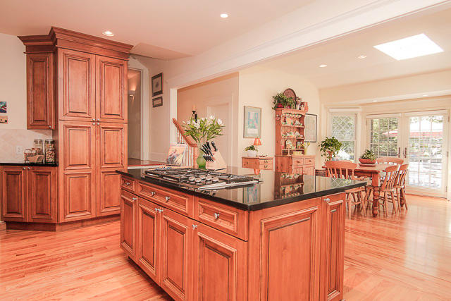 21 Old Studio Road New Canaan, CT 06840 - Photo 15 of 39 a kitchen with stainless steel appliances granite countertop a stove and a refrigerator