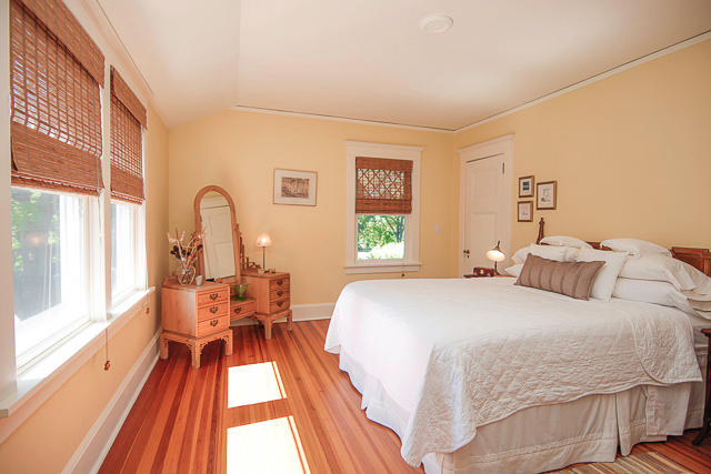 21 Old Studio Road New Canaan, CT 06840 - Photo 24 of 39 a bedroom with a bed and a large window with outer view