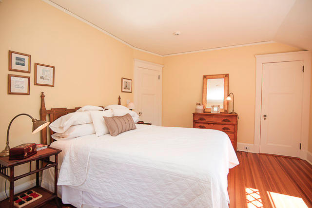 21 Old Studio Road New Canaan, CT 06840 - Photo 25 of 39 a bedroom with a bed and a dresser with mirror