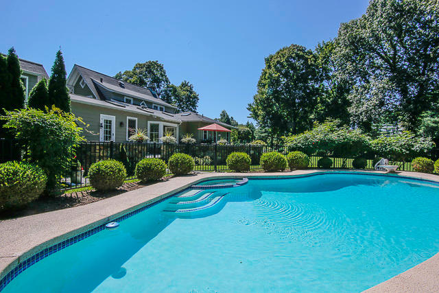 21 Old Studio Road New Canaan, CT 06840 - Photo 30 of 39 a house view with swimming pool and garden