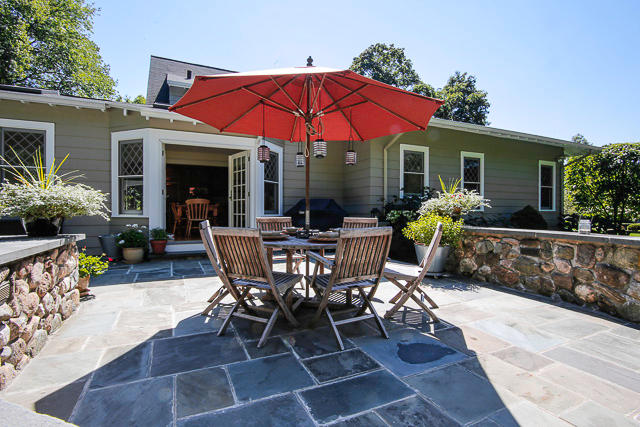 21 Old Studio Road New Canaan, CT 06840 - Photo 32 of 39 a patio with tables and chairs