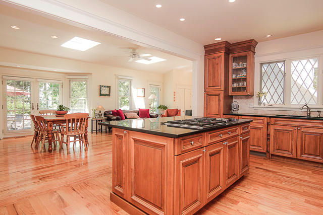 21 Old Studio Road New Canaan, CT 06840 - Photo 4 of 39 a kitchen with stainless steel appliances granite countertop a stove and a wooden cabinets