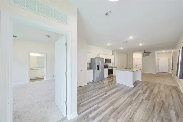 a view of a livingroom with a ceiling fan